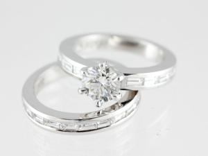 Six Claw Round Brilliant Diamond Engagement Ring alongside Baguette cut Diamond Wedding Band, without a Milgrain edge. Gold River Jewellers, Brisbane.