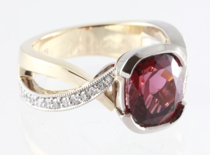 Gold River Jewellers, Two Tone, White and Yellow gold dress ring with a diamond crossover shank and a rectangle cushion cut Rhodolite Garnet in the centre.